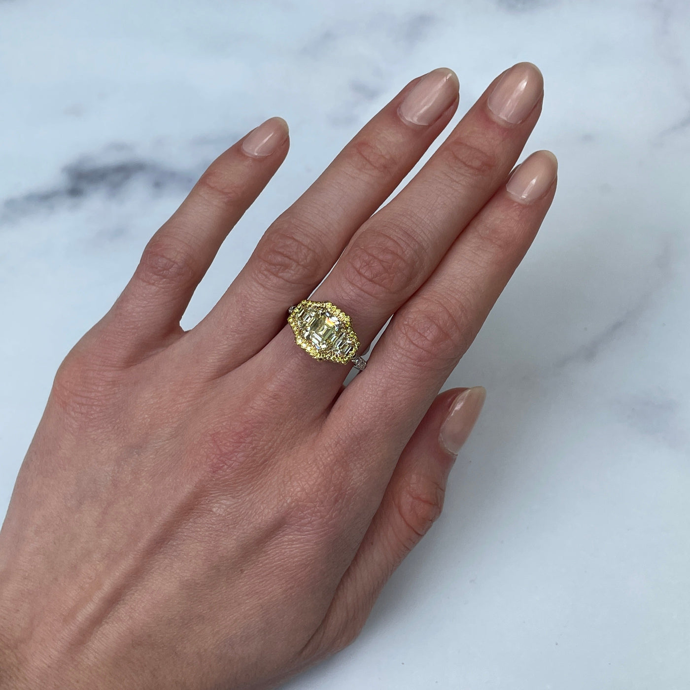 Platinum and Yellow Gold Yellow Emerald Cut Diamond Ring